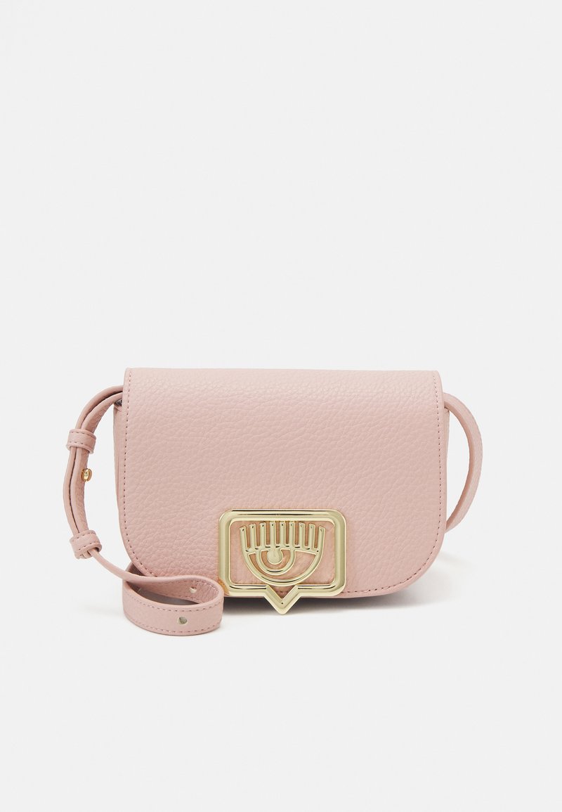 Light-pink Eyelike buckle crossbody on clean background