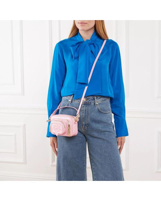 Pink crossbody variant with tonal shoulder strap