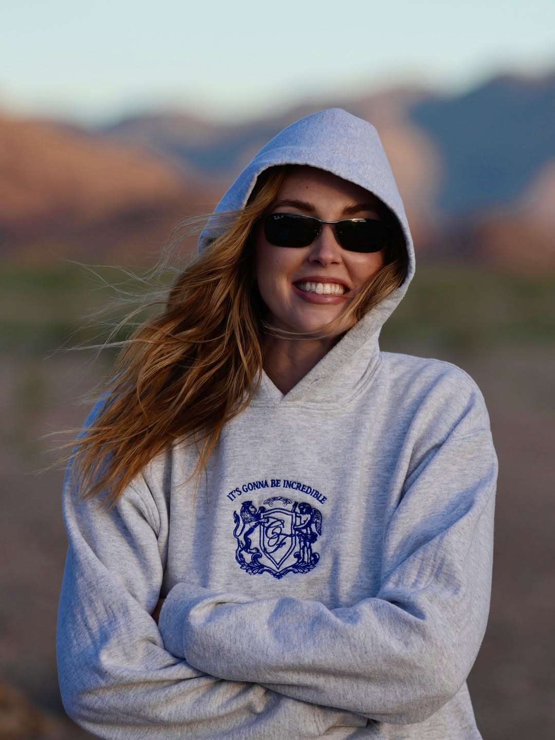 Campaign view of the hoodie worn outdoors