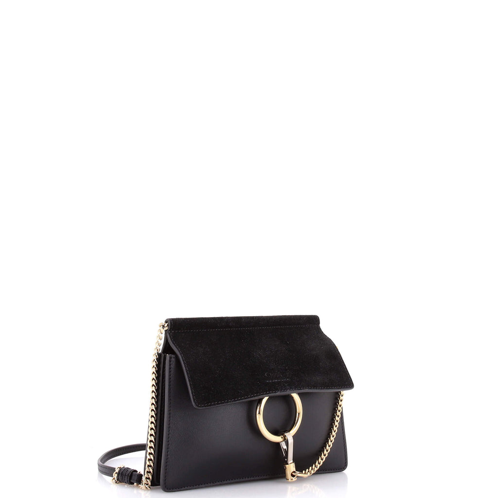 Three-quarter view — the chain-and-leather strap