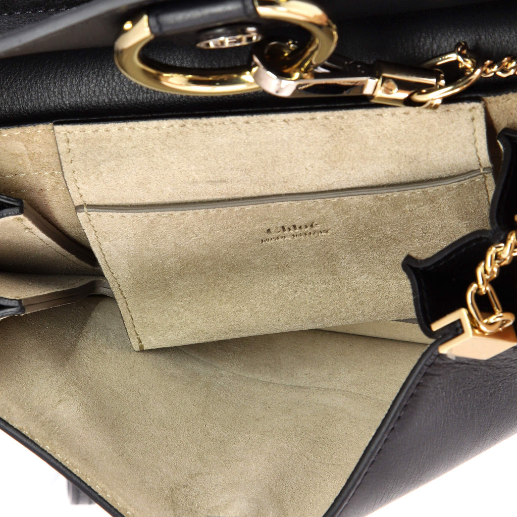 O-ring hardware and Chloé-embossed interior detail