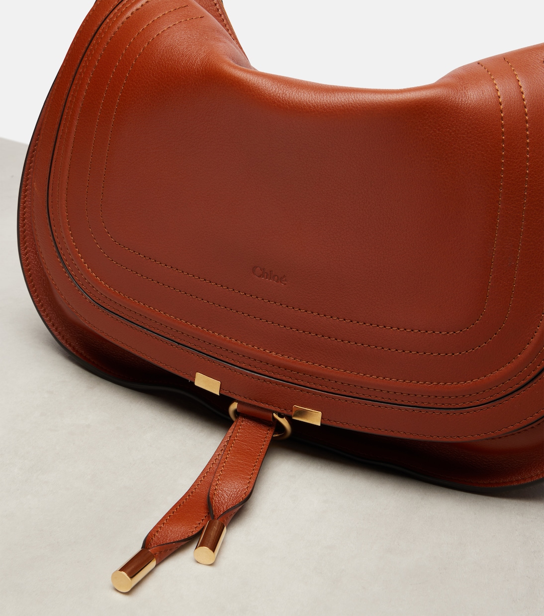Front-flap detail — embossed Chloé and leather pulls