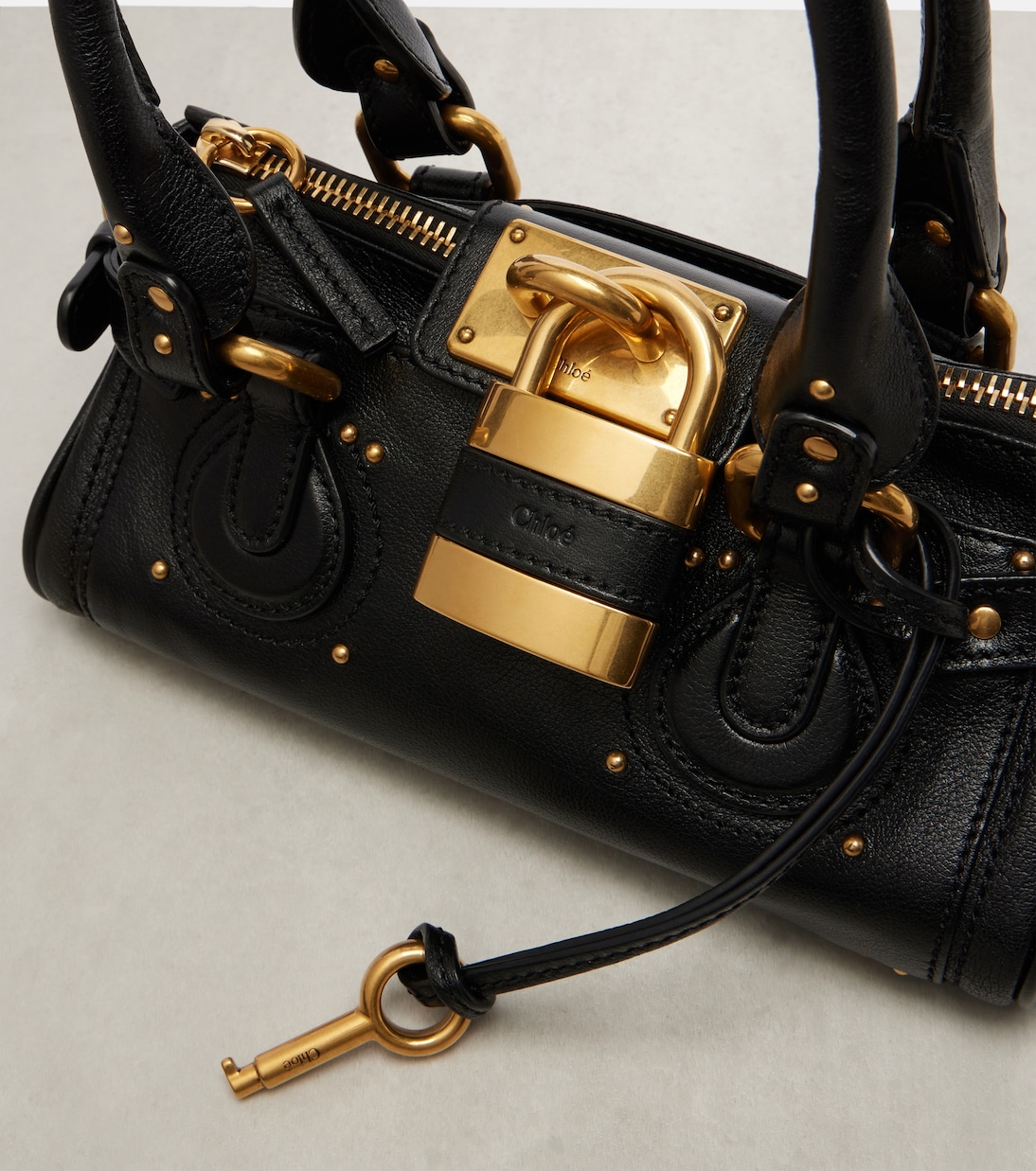 Padlock and key detail, engraved Chloé