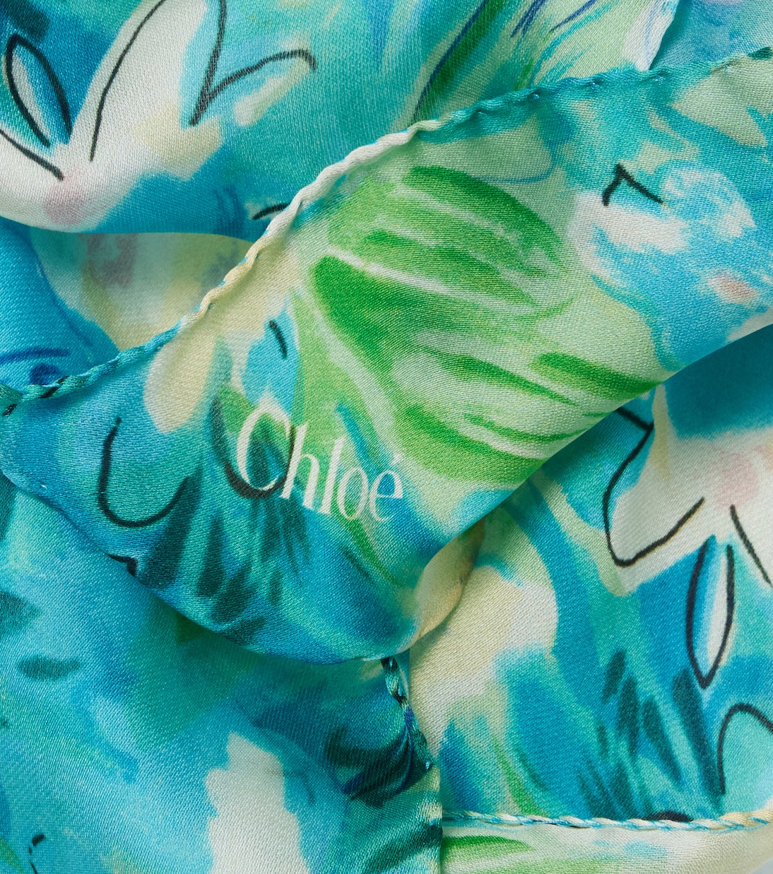 Detail of the print and hand-rolled edge with Chloé signature