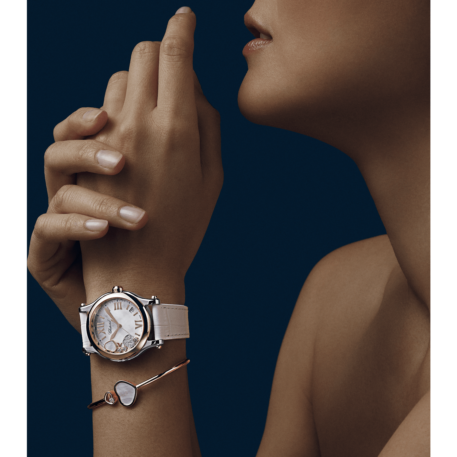 Close worn detail of the heart and diamond elements