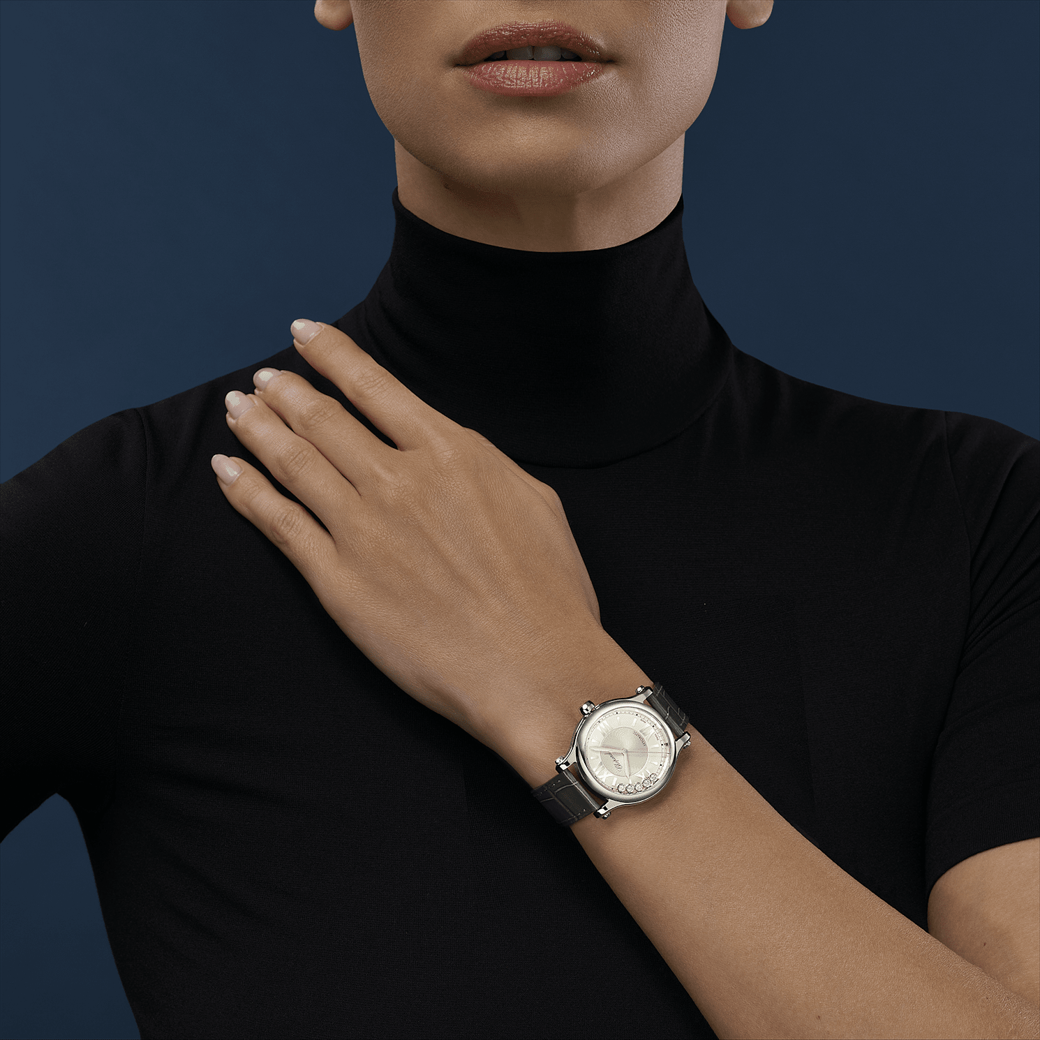 Worn view showing the dancing-diamond dial on the wrist