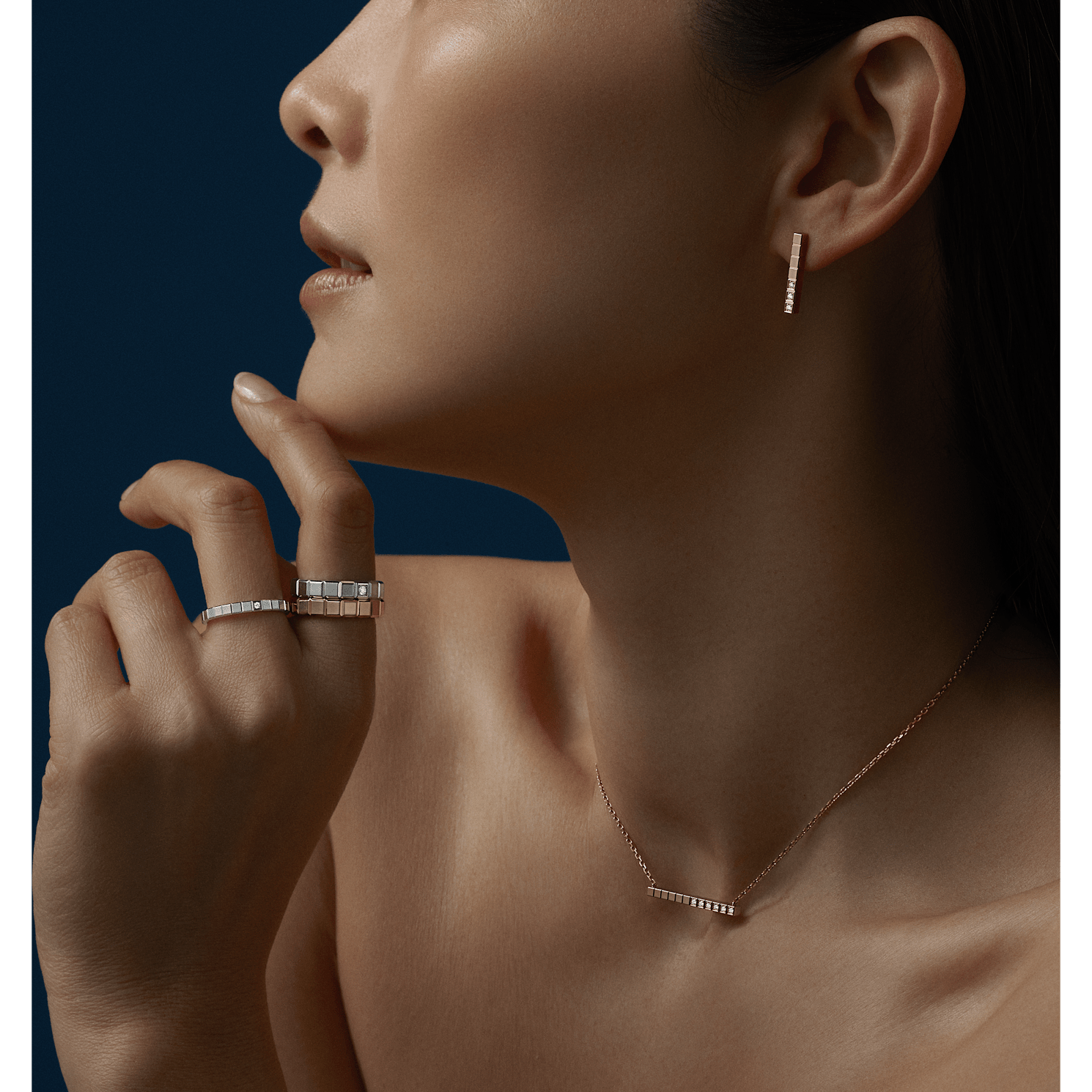 Worn view with Ice Cube rings and necklace
