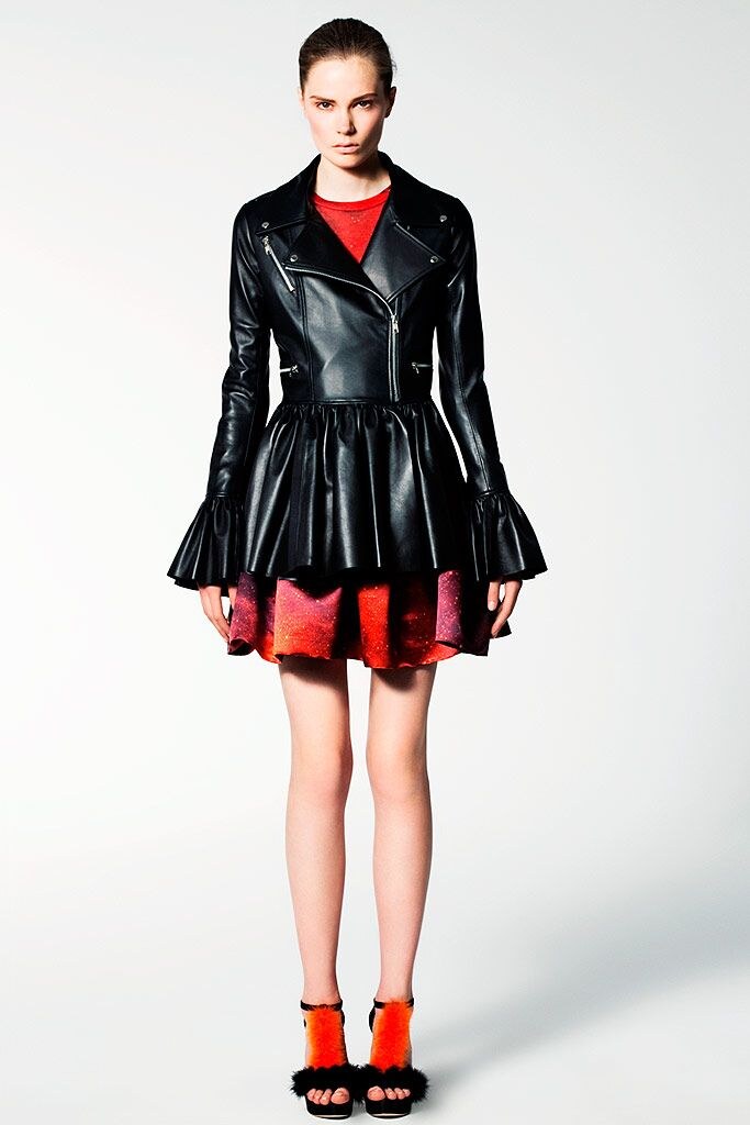 Leather layer over red cosmic print