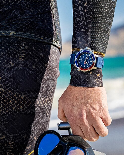 blue dive watch on wrist