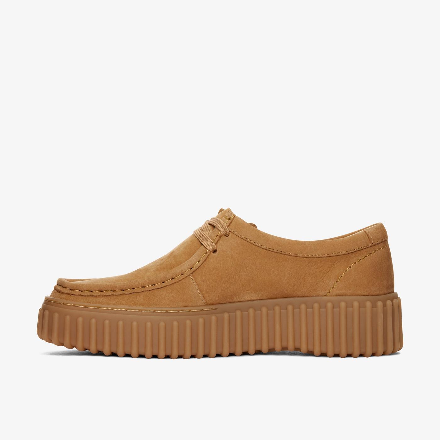 Side view with the ribbed outsole