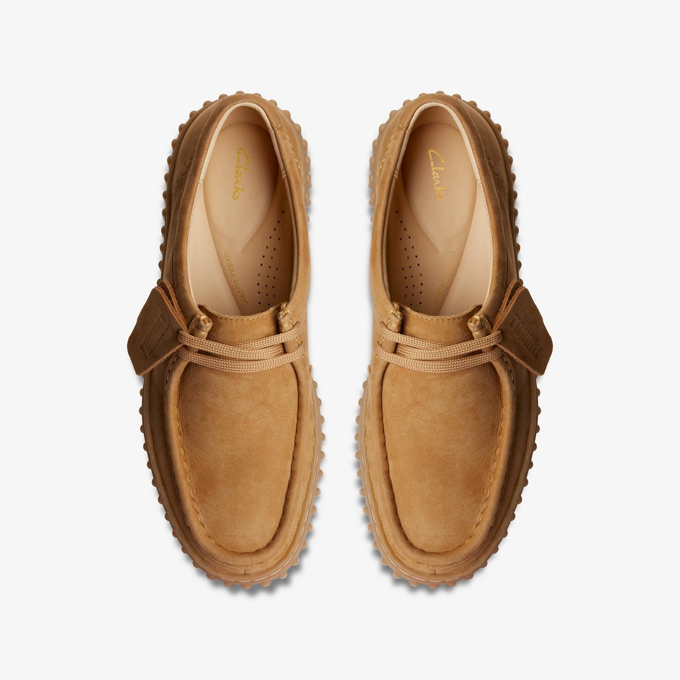 Top view with moccasin-inspired proportions