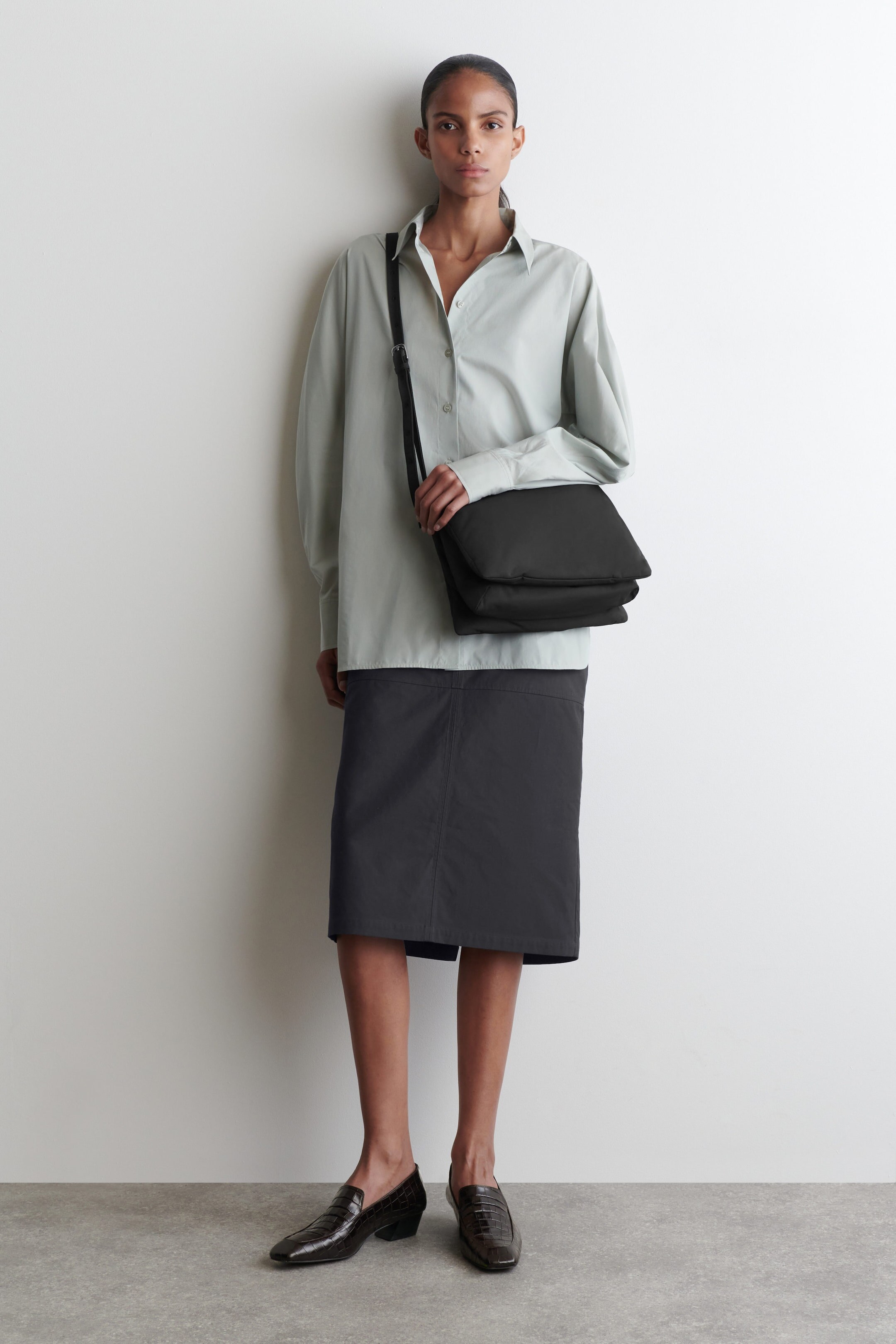 Black worn with pencil skirt