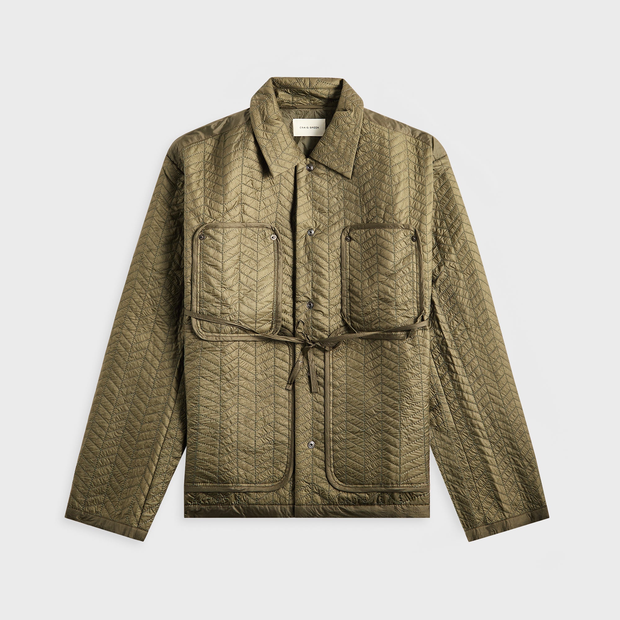 green quilted worker jacket