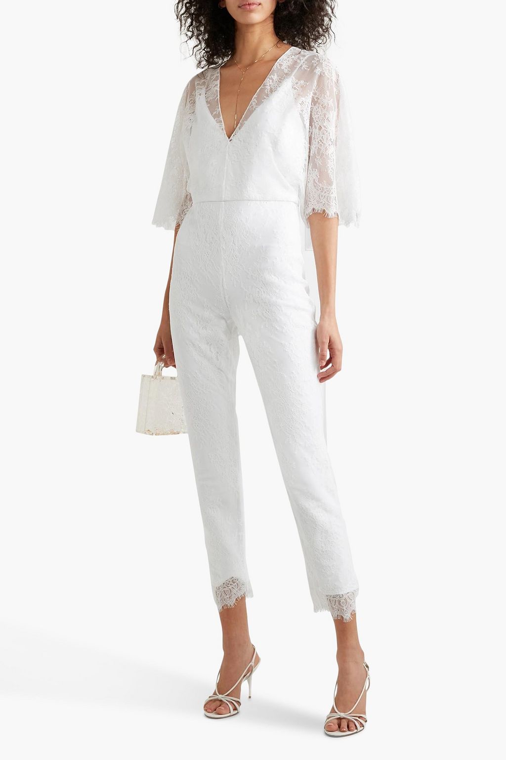 Model view showing the cropped leg and V neckline