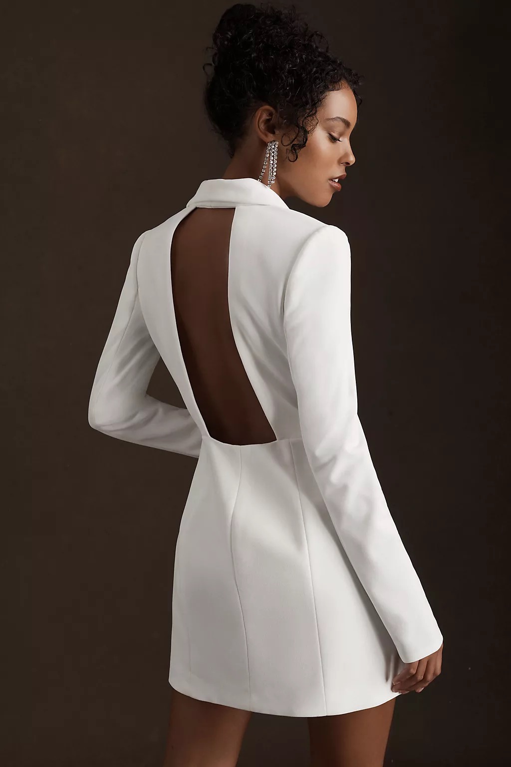 Clean blazer silhouette with sharp shoulder line