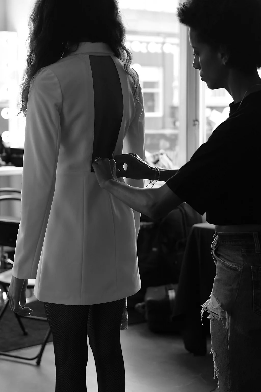 Side view with long sleeves and short hem proportion