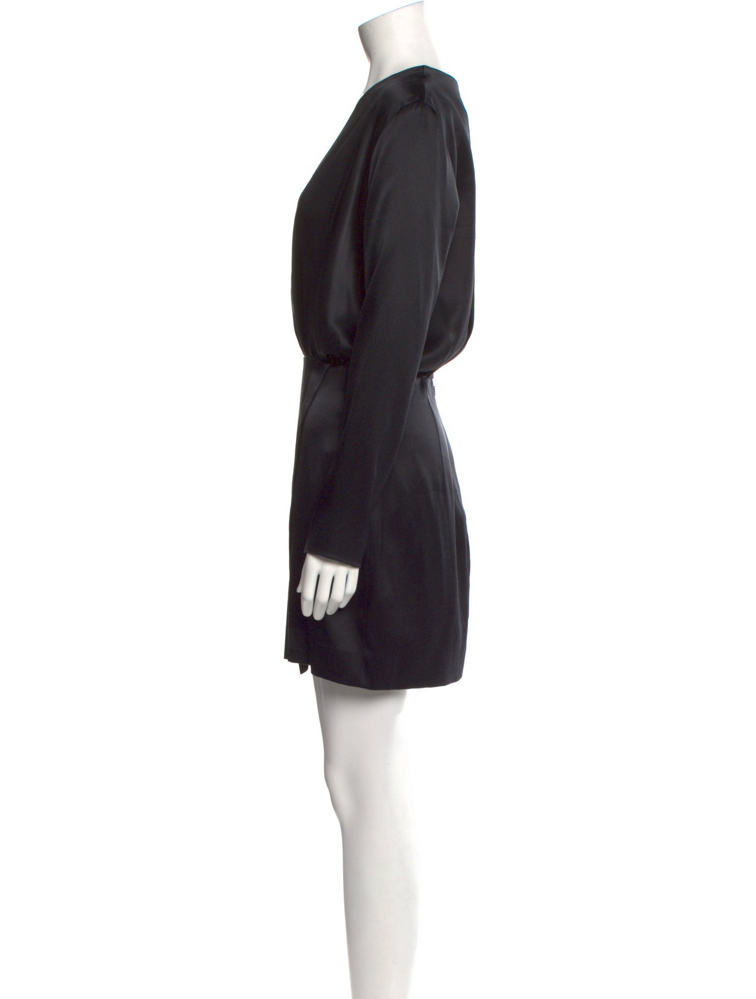 Side view showing the short, fluid hemline