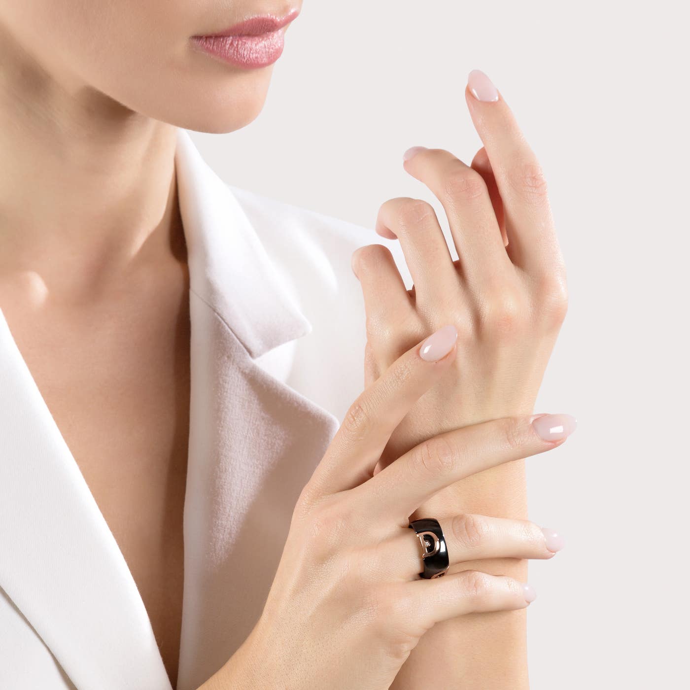 D.Icon ring worn as a bold index-finger jewel