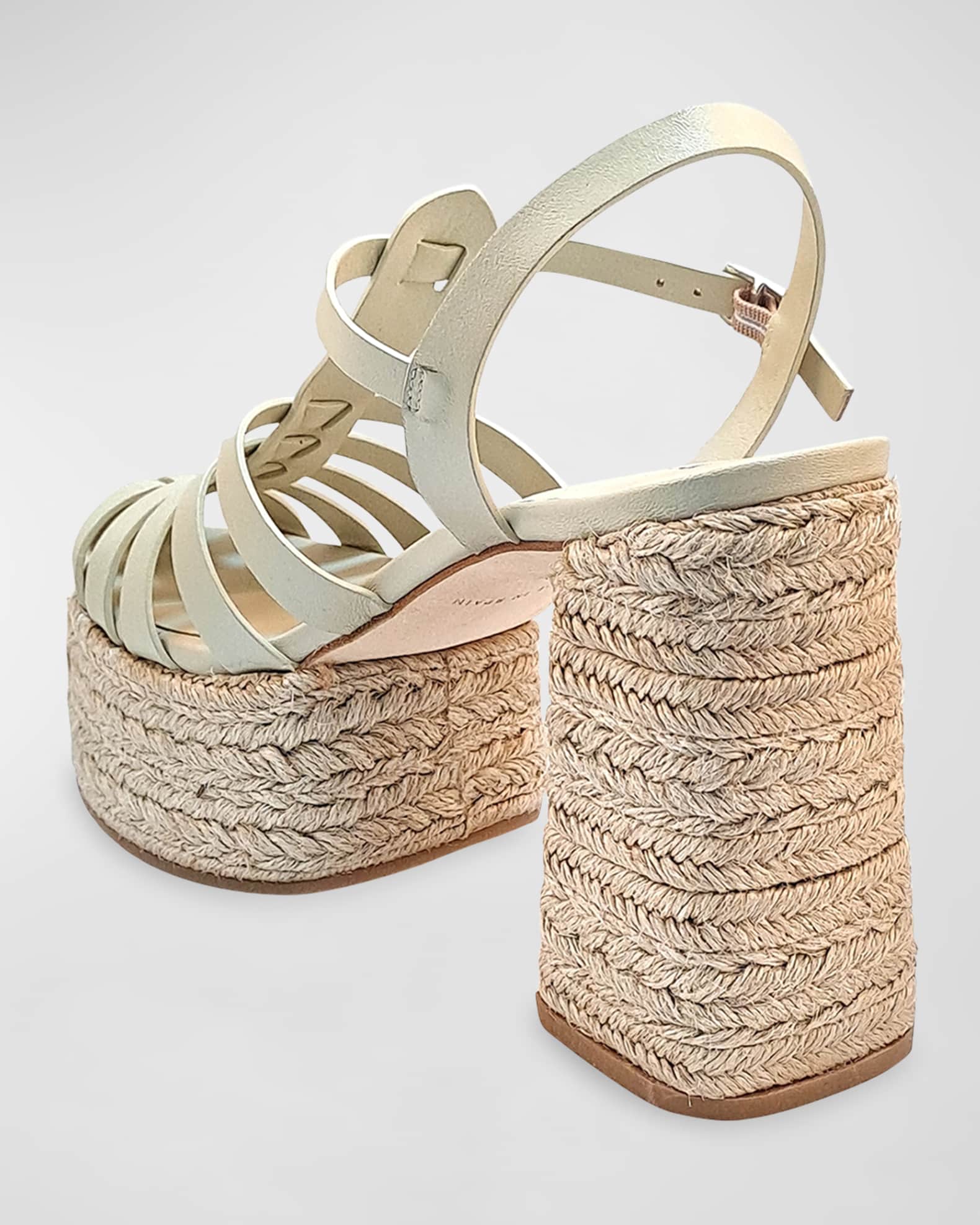Rear angle with ankle strap and raffia-wrapped block heel