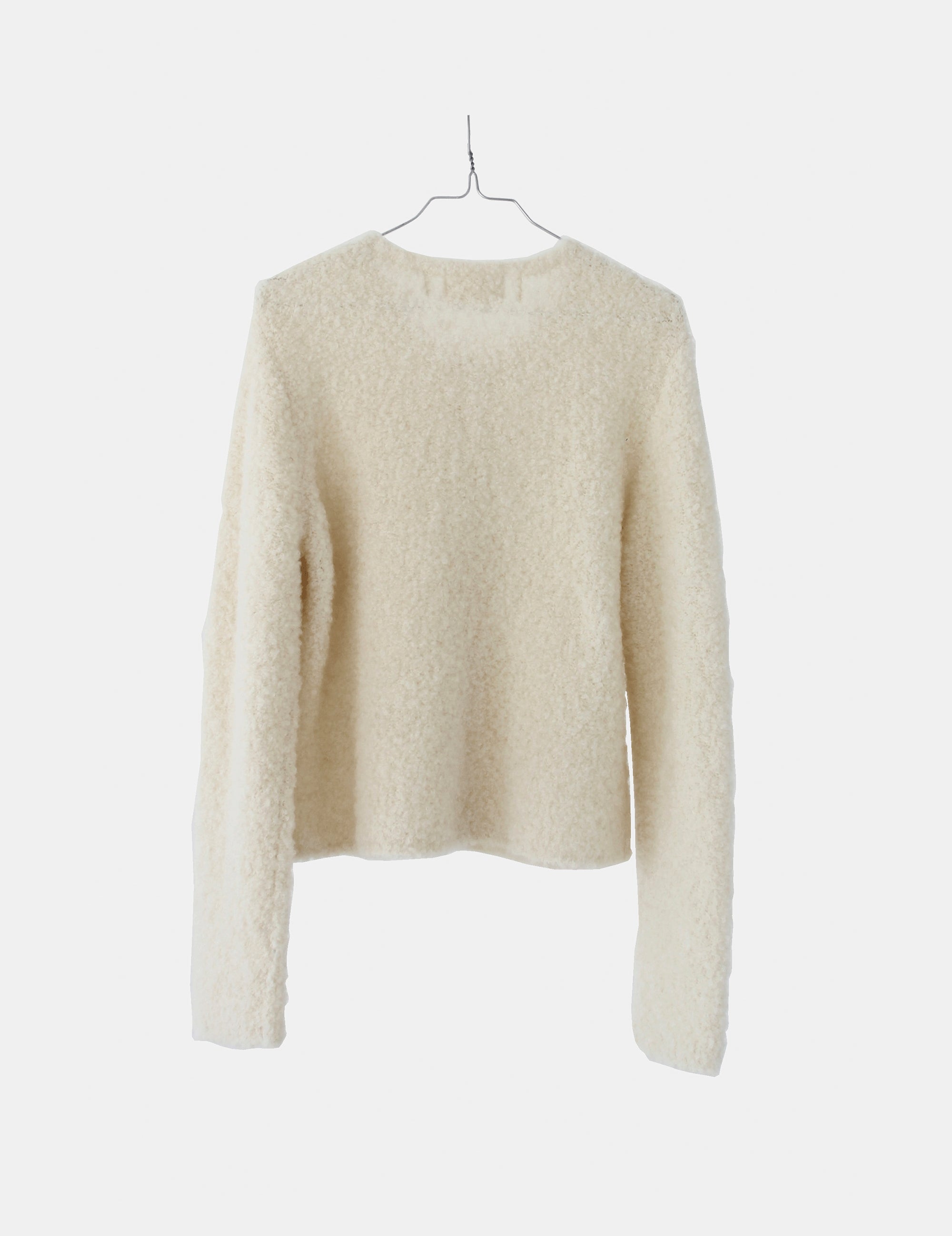 Hanger view showing the round neckline