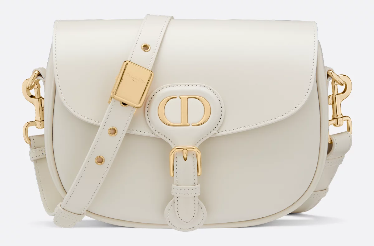 Ivory box calfskin, front view with the embossed CD on the tab
