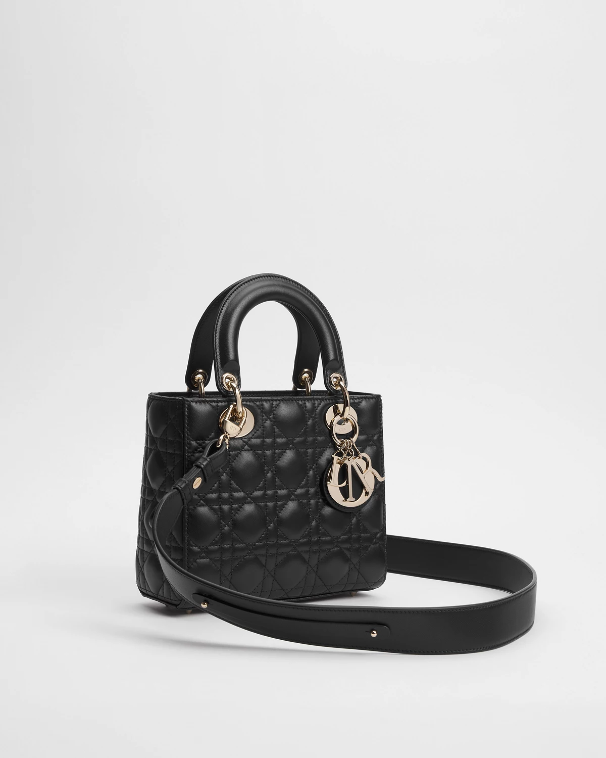 Three-quarter view with the crossbody strap attached