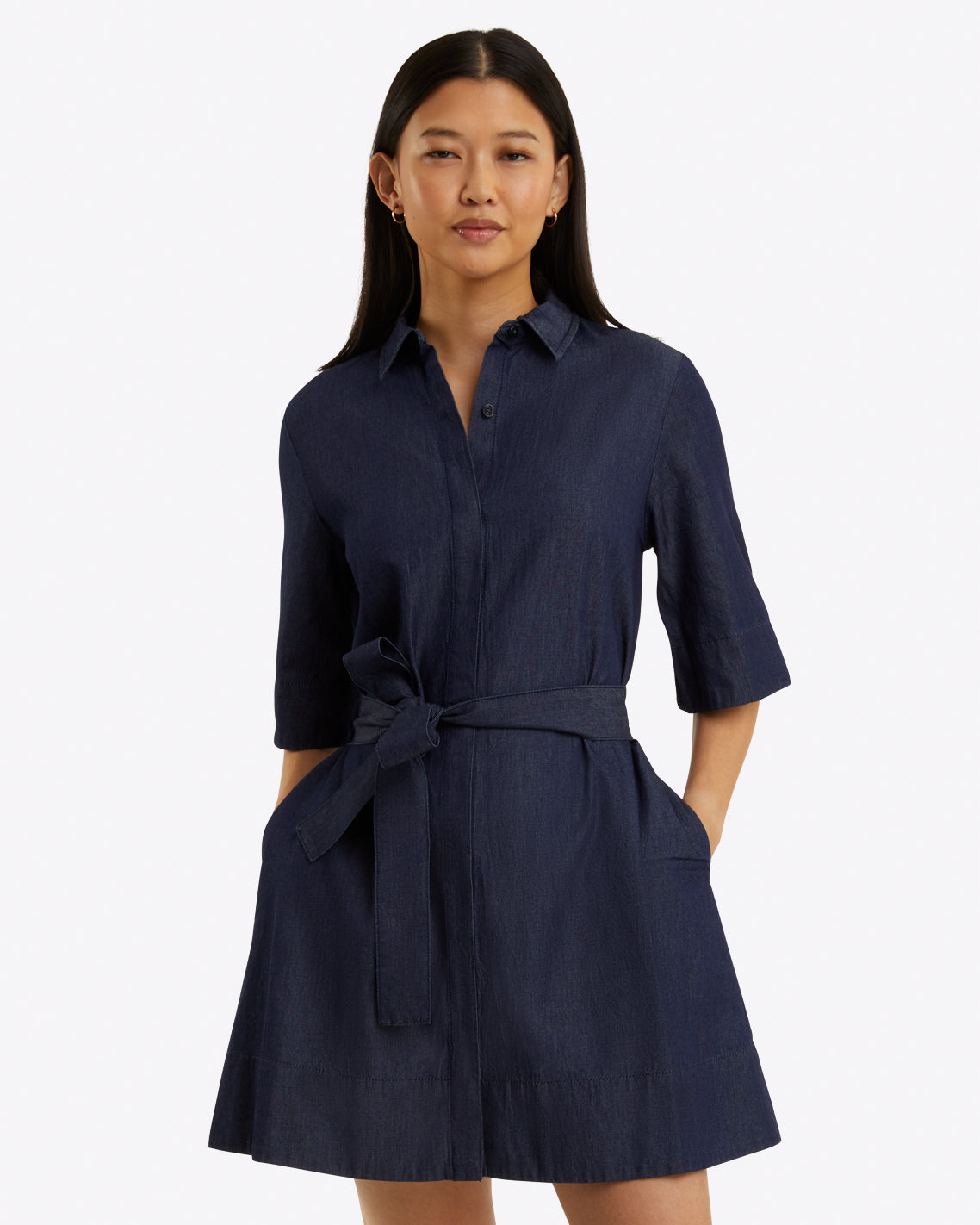 cropped view of collar, belt and sleeve