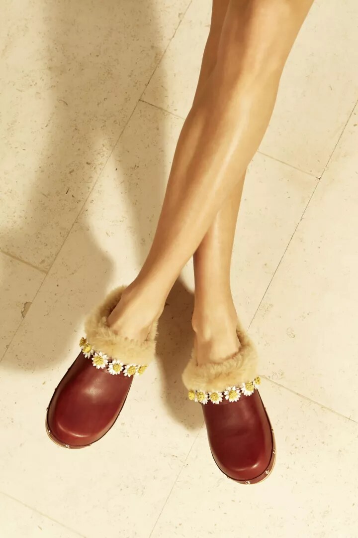 on-foot view of the burgundy Jean Daisy Clog