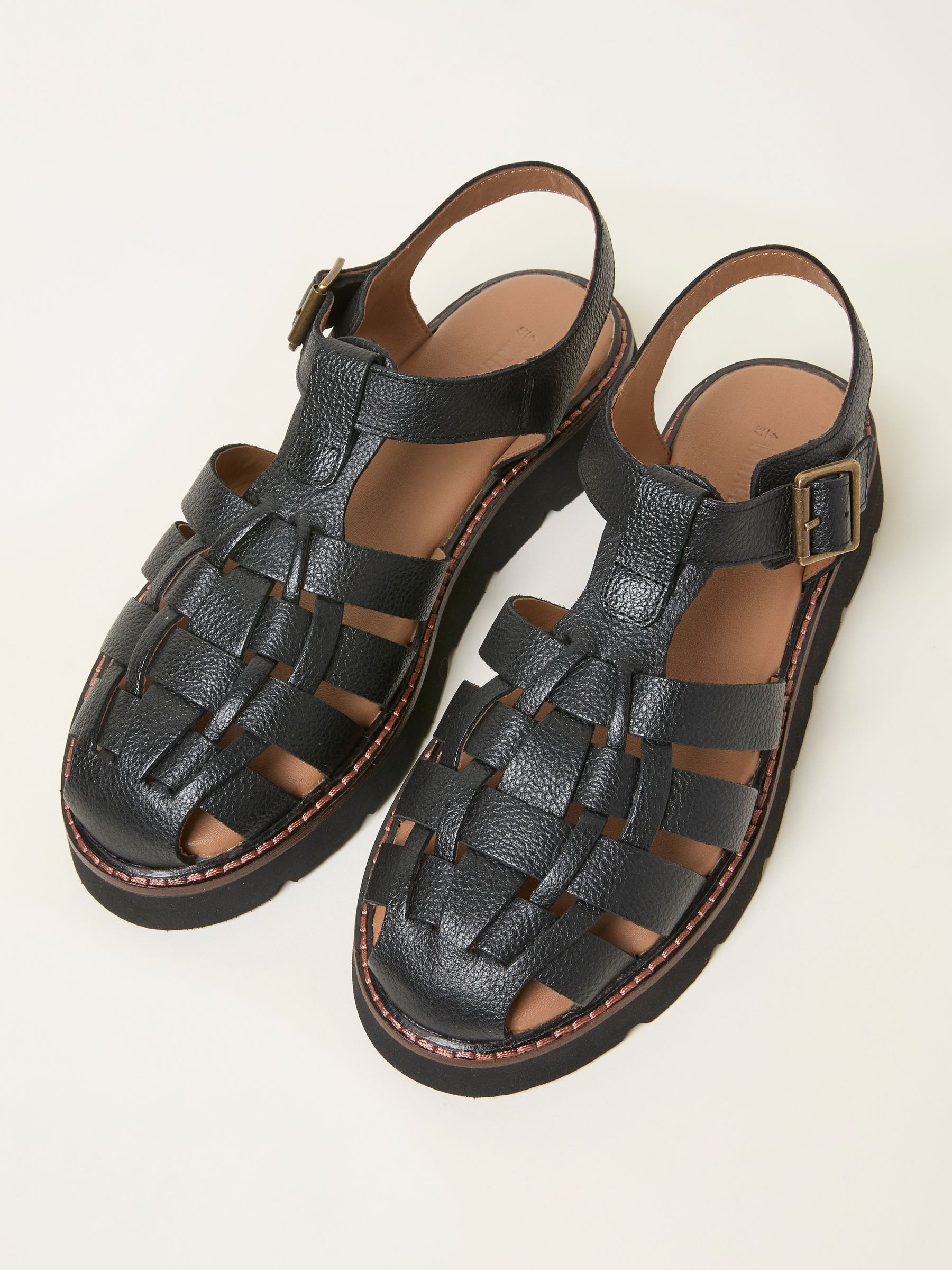 Cali Black Leather Fisherman Sandal — location still life