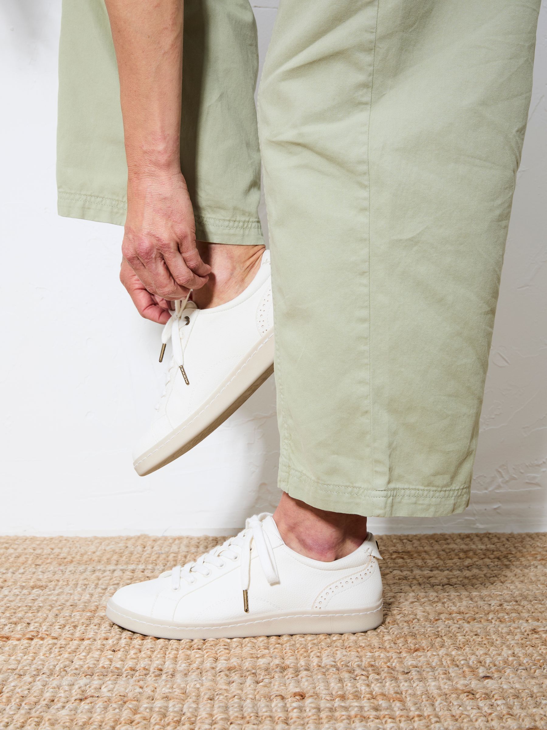 White Nora Lace Up Trainer — location worn