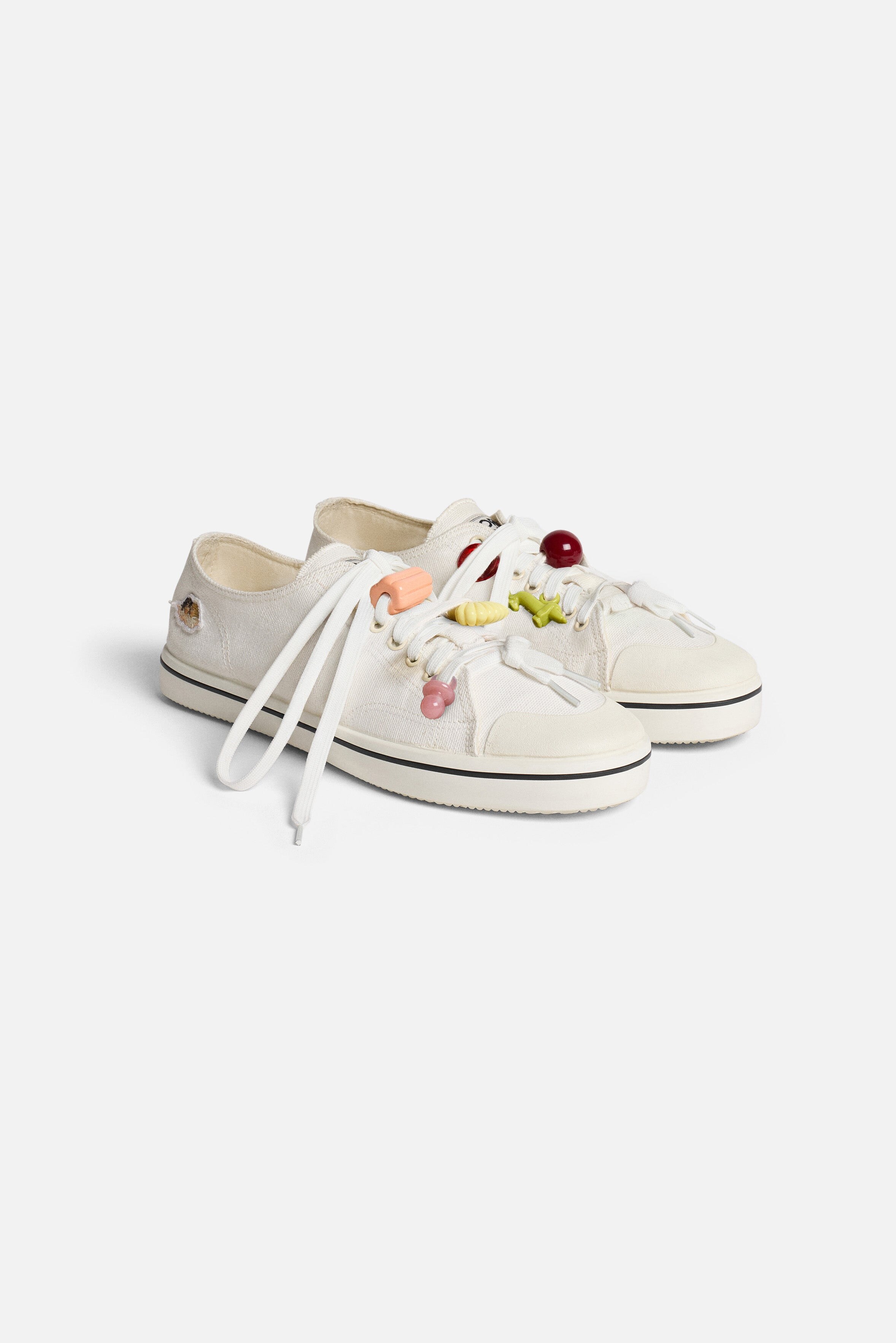 angled view of the lace-up cotton canvas upper