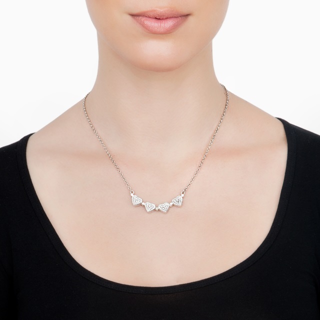 clover motif worn as a pendant