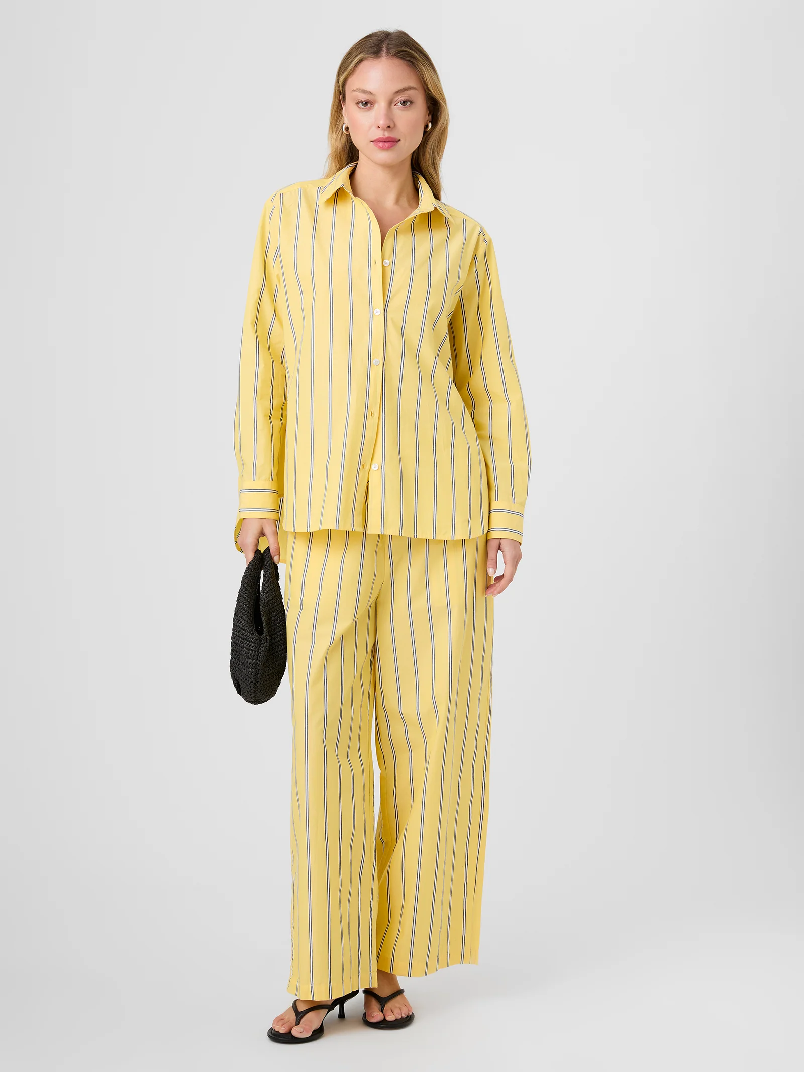 Styled with the matching drawstring pant