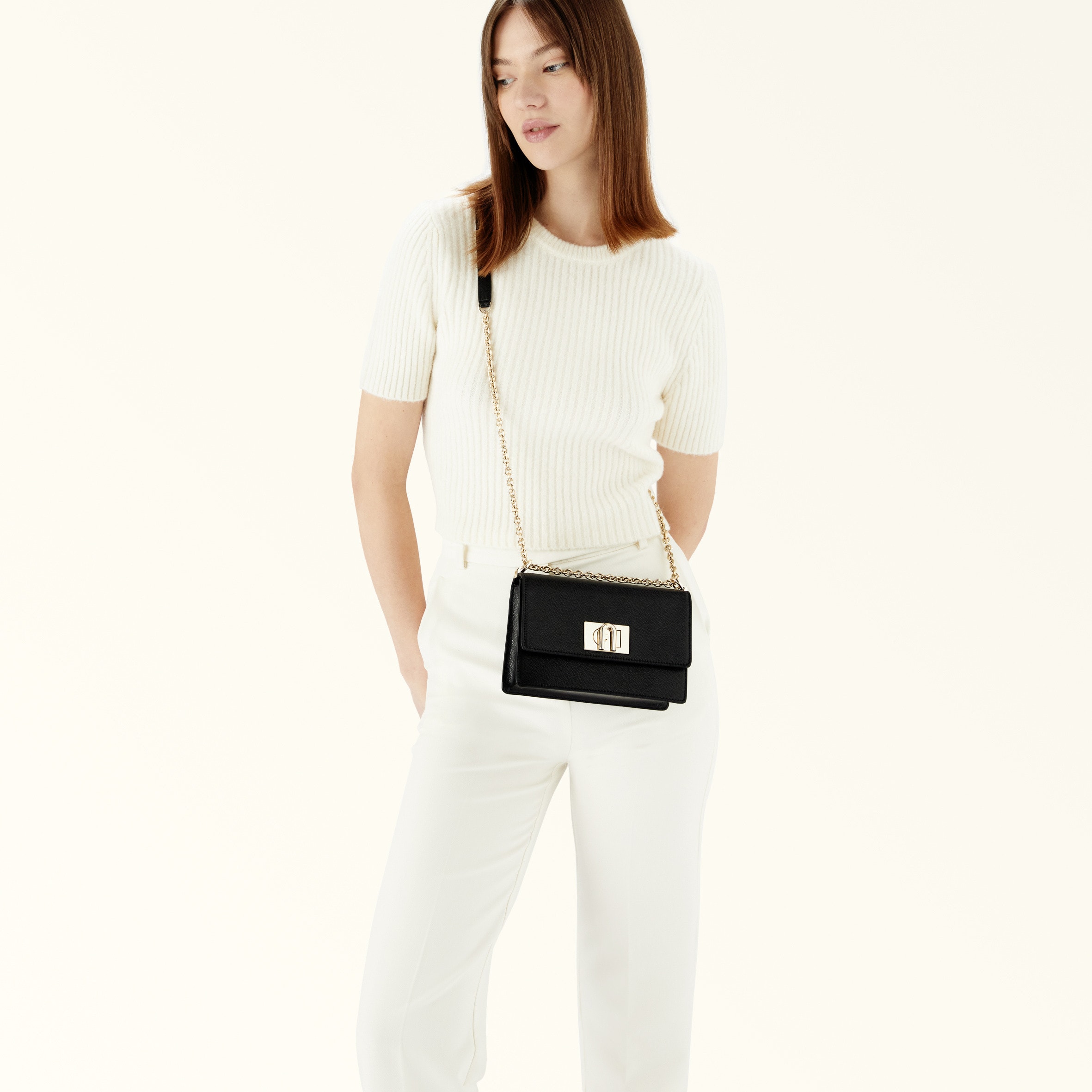 worn as a clean day-to-evening crossbody