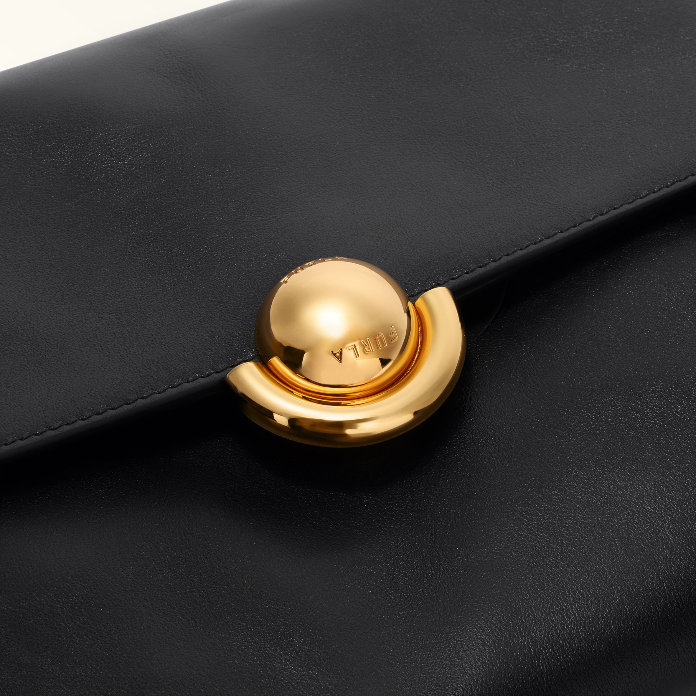 gold sphere clasp closeup