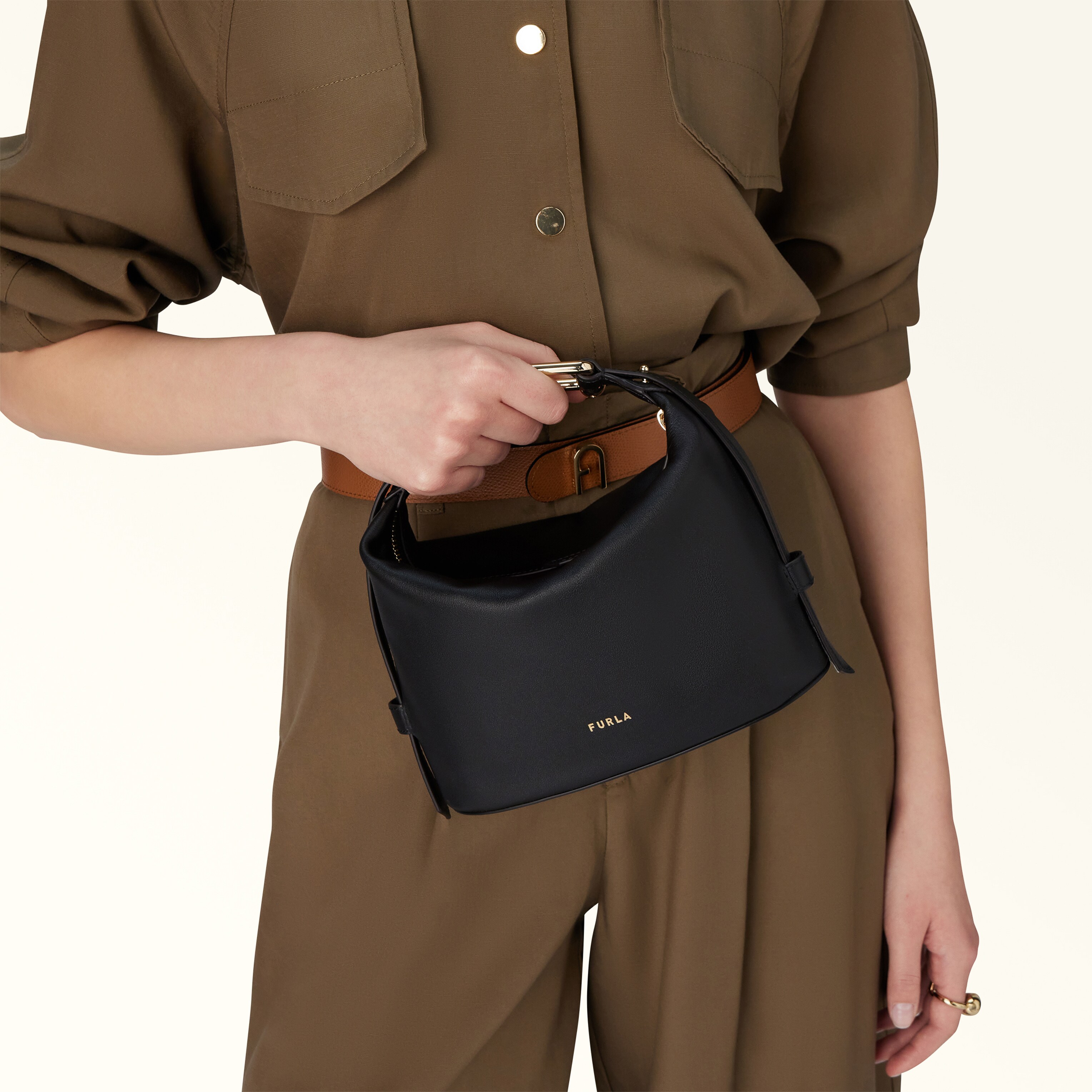 worn as a compact shoulder bag