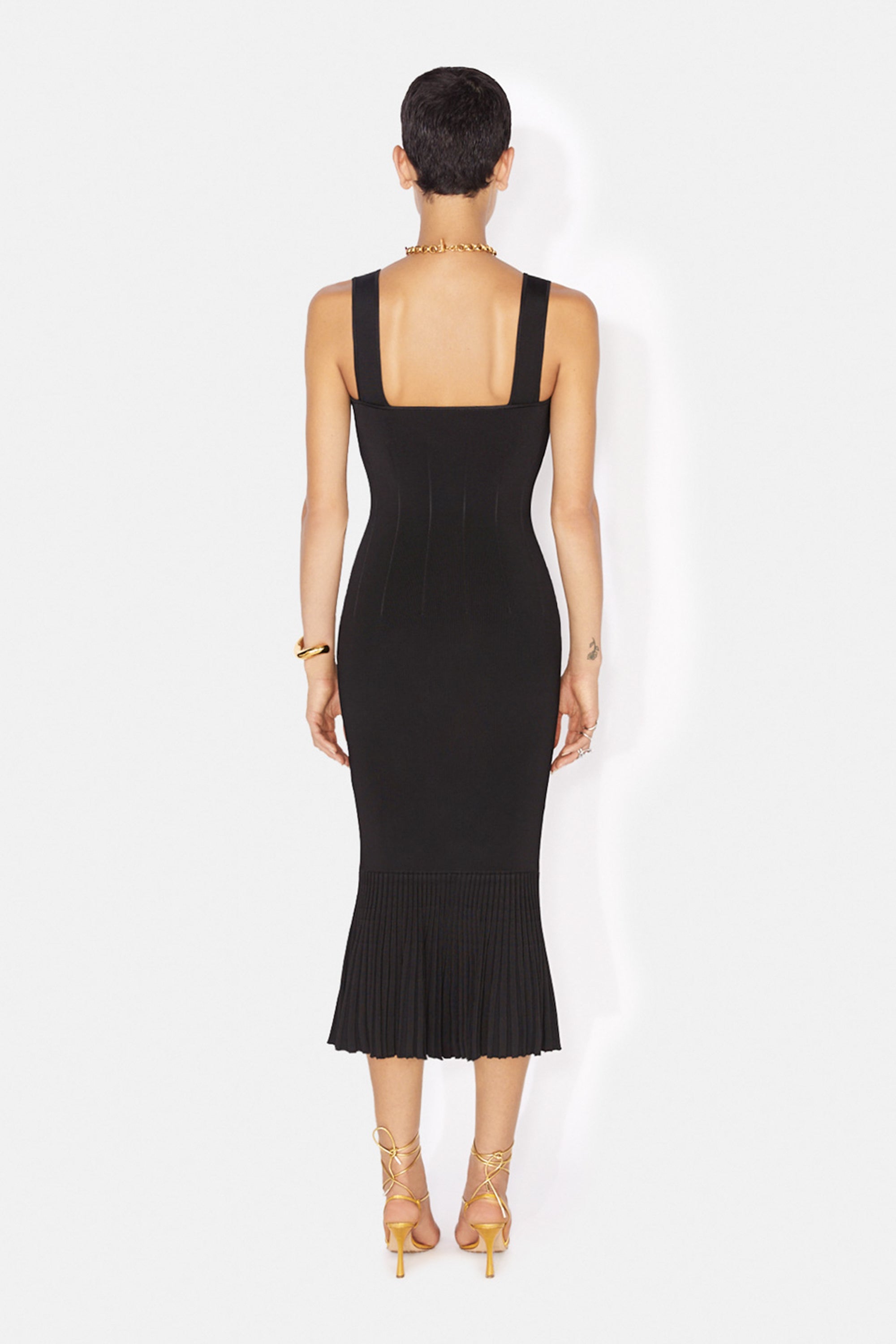 corset-like waist lines and ruffled hem
