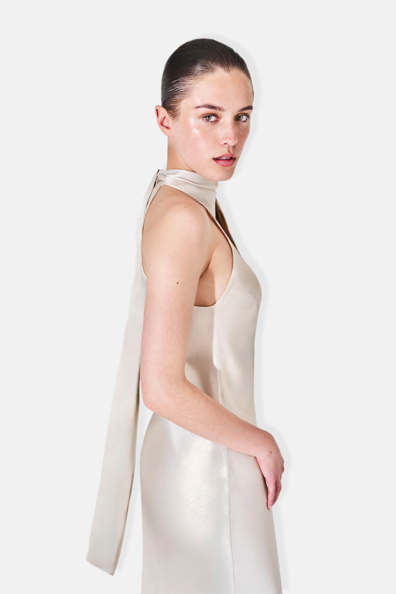 detail of the glossy halter neckline