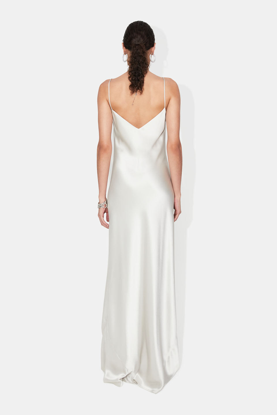 side drape of the minimalist silhouette