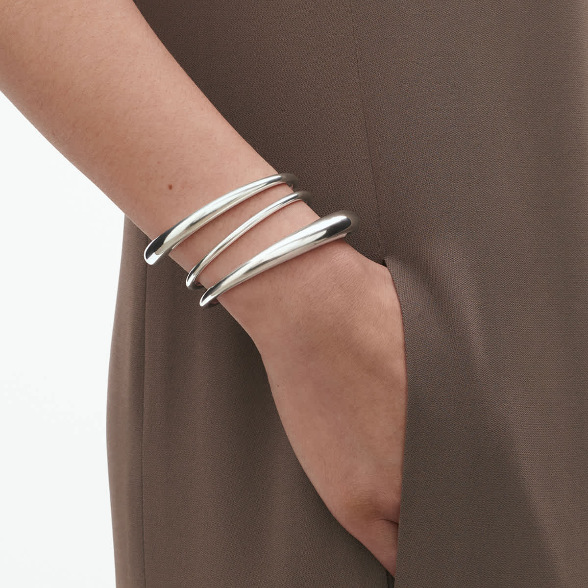 Stacked Mercy bangles in silver
