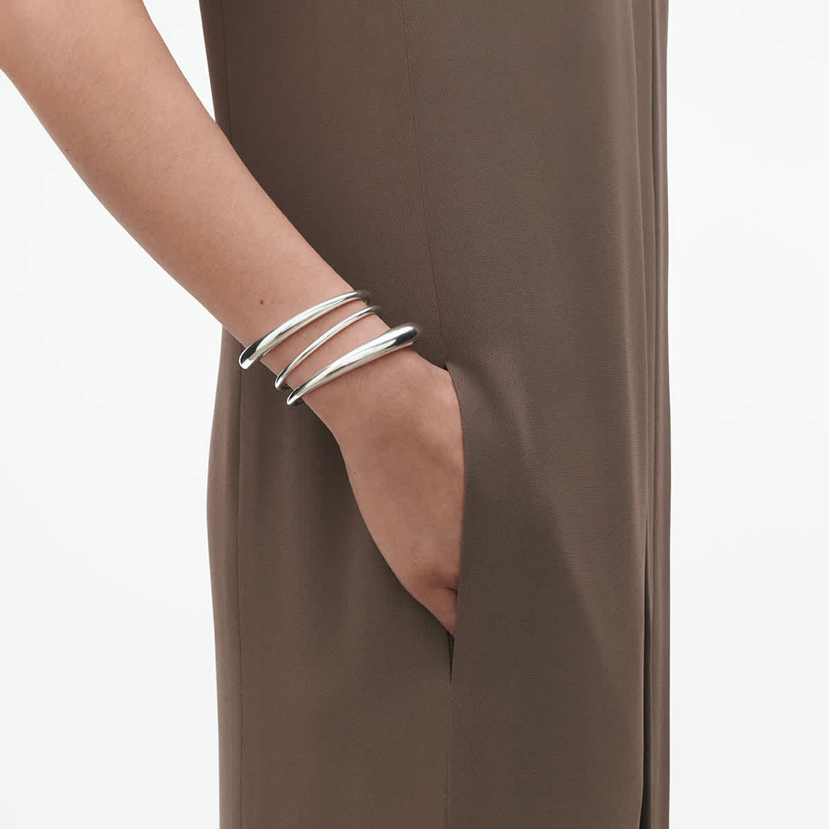 Twist bangle worn at wrist