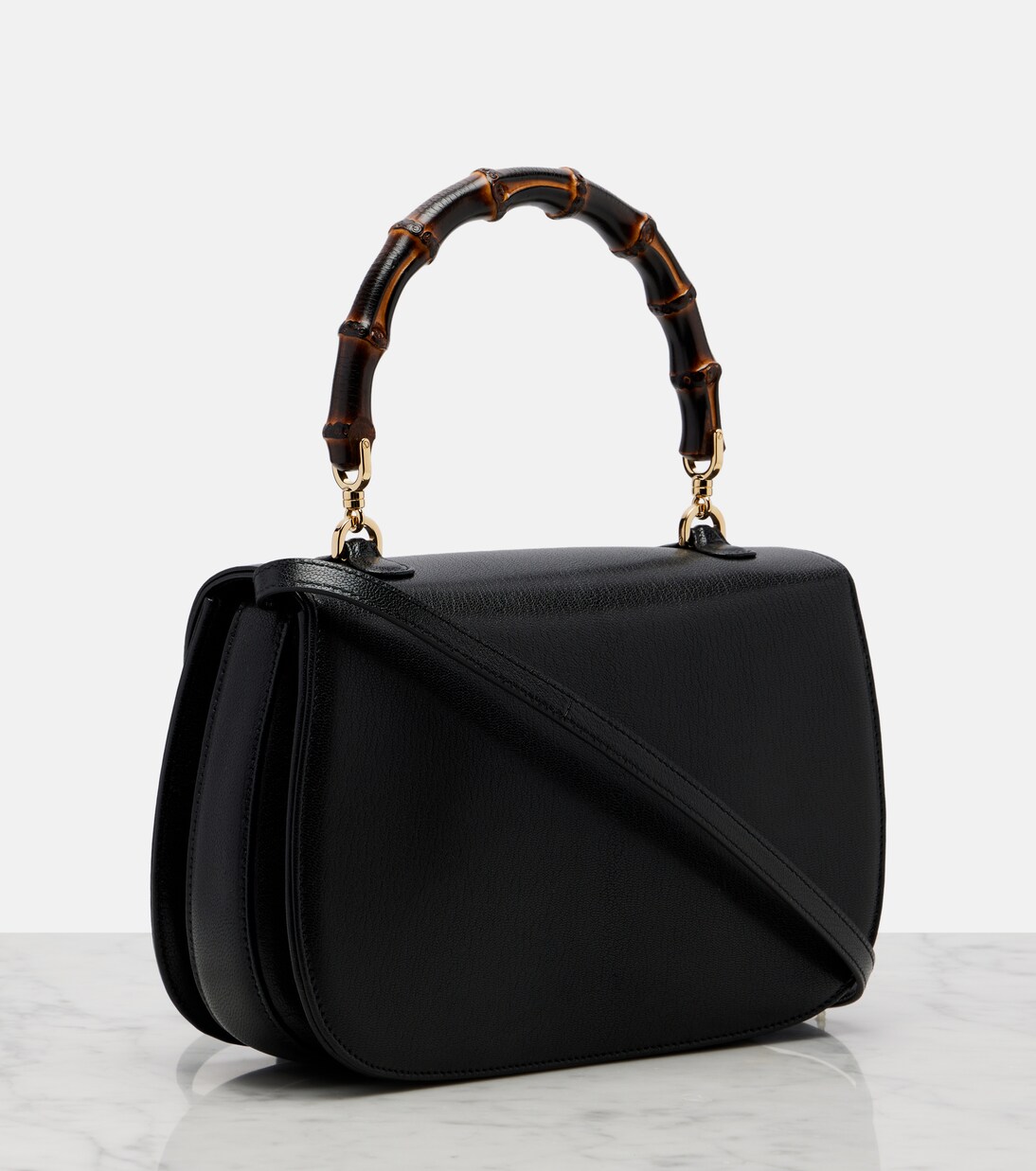 Structured trapezoid body and turn-lock flap
