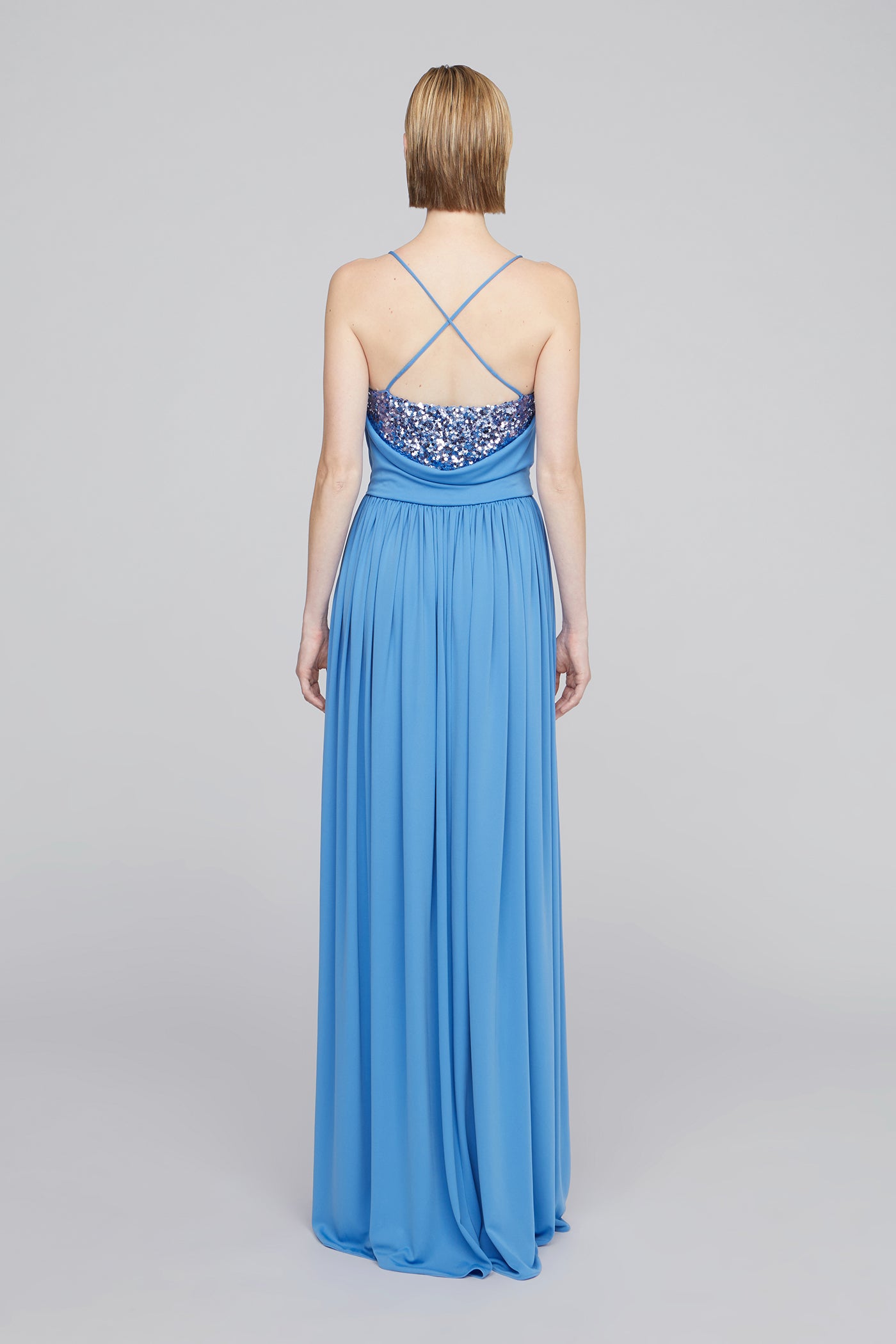 crisscross back straps and flowing skirt