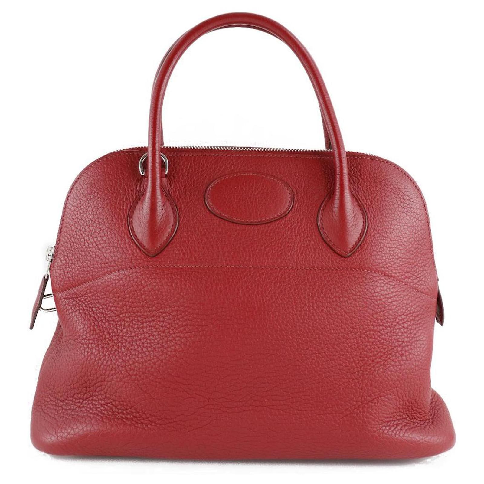 Red Clemence Bolide showing the soft, structured body