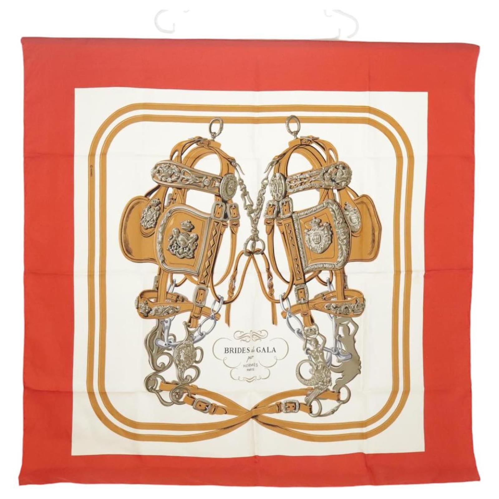 Brides de Gala in red and camel silk twill