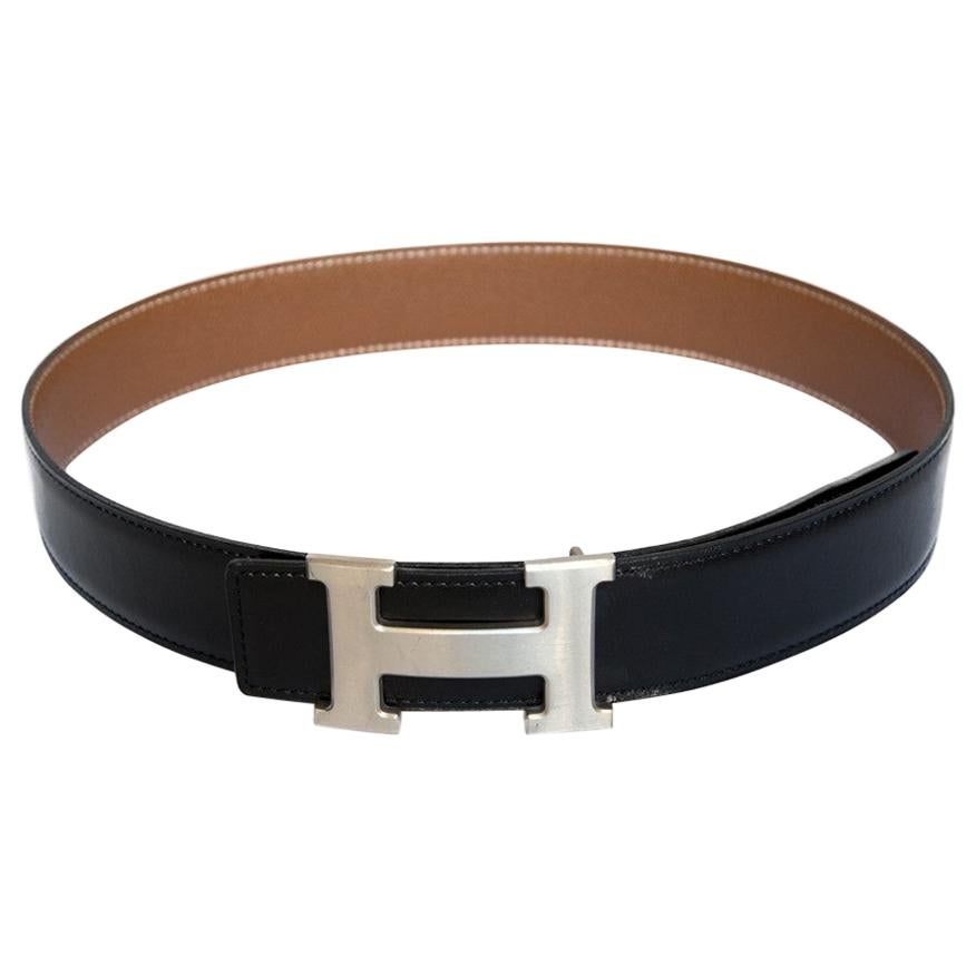 Reversible black-and-tan strap with the silver H buckle