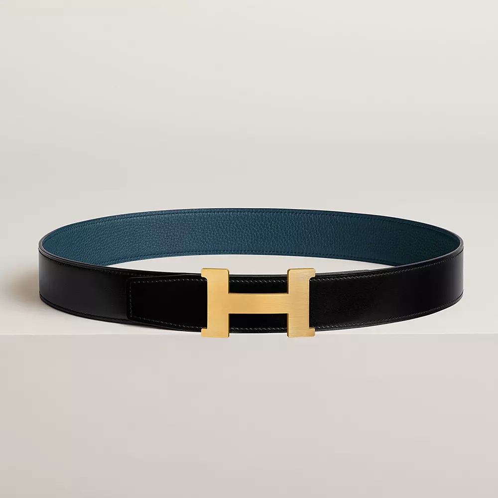 Reversible black/blue strap with the gold H buckle