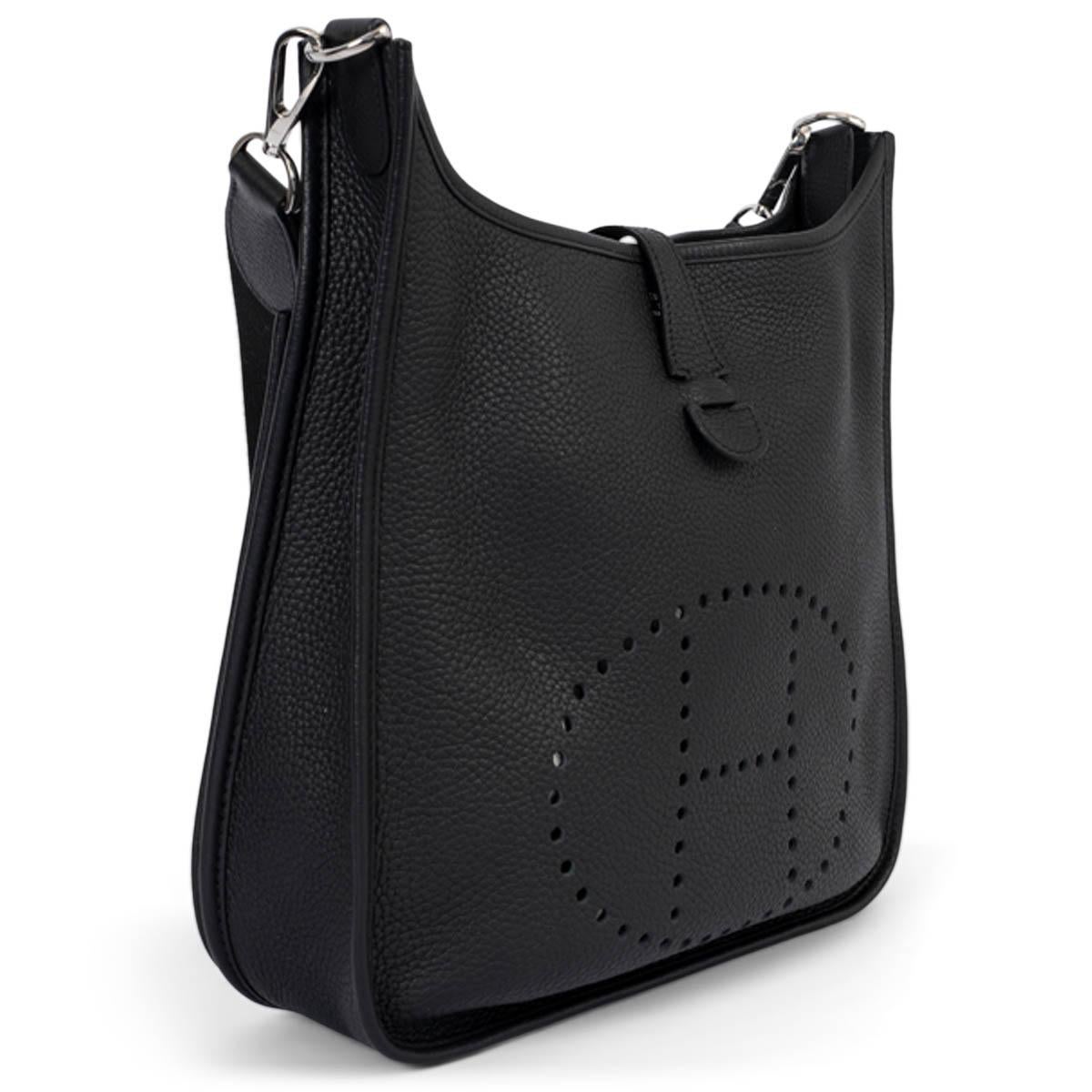 Black Evelyne III worn cross-body — the slim profile and back pocket