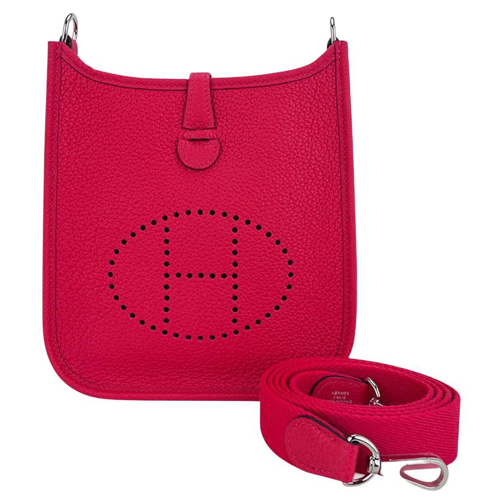Rose mini Evelyne on its woven canvas strap