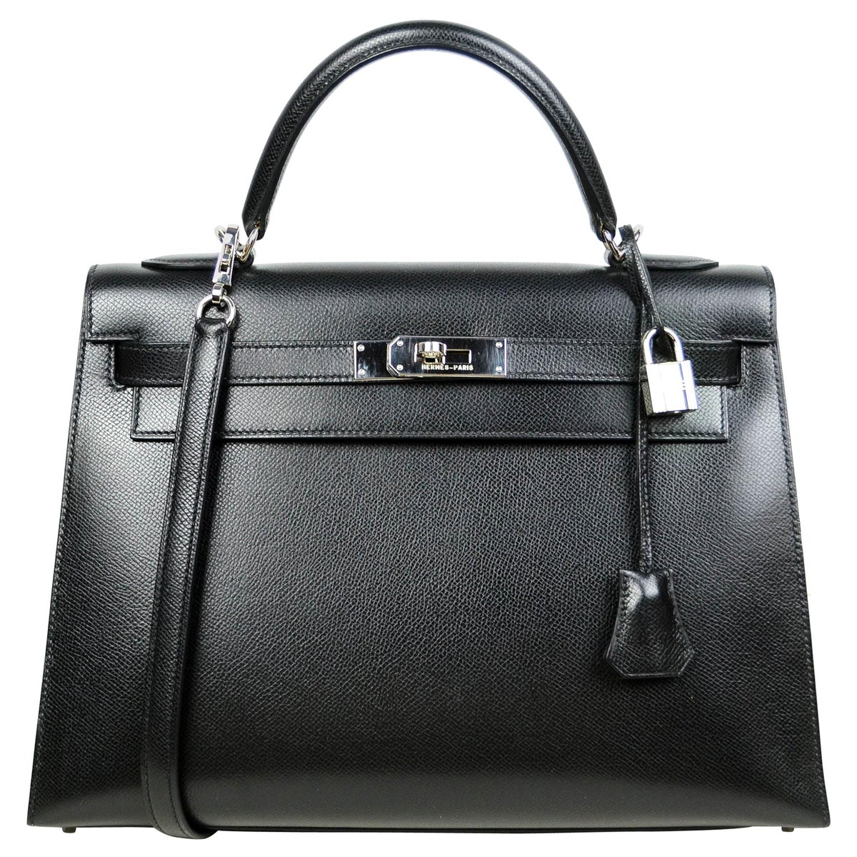 Kelly 32 in black with the shoulder strap and palladium turn-lock